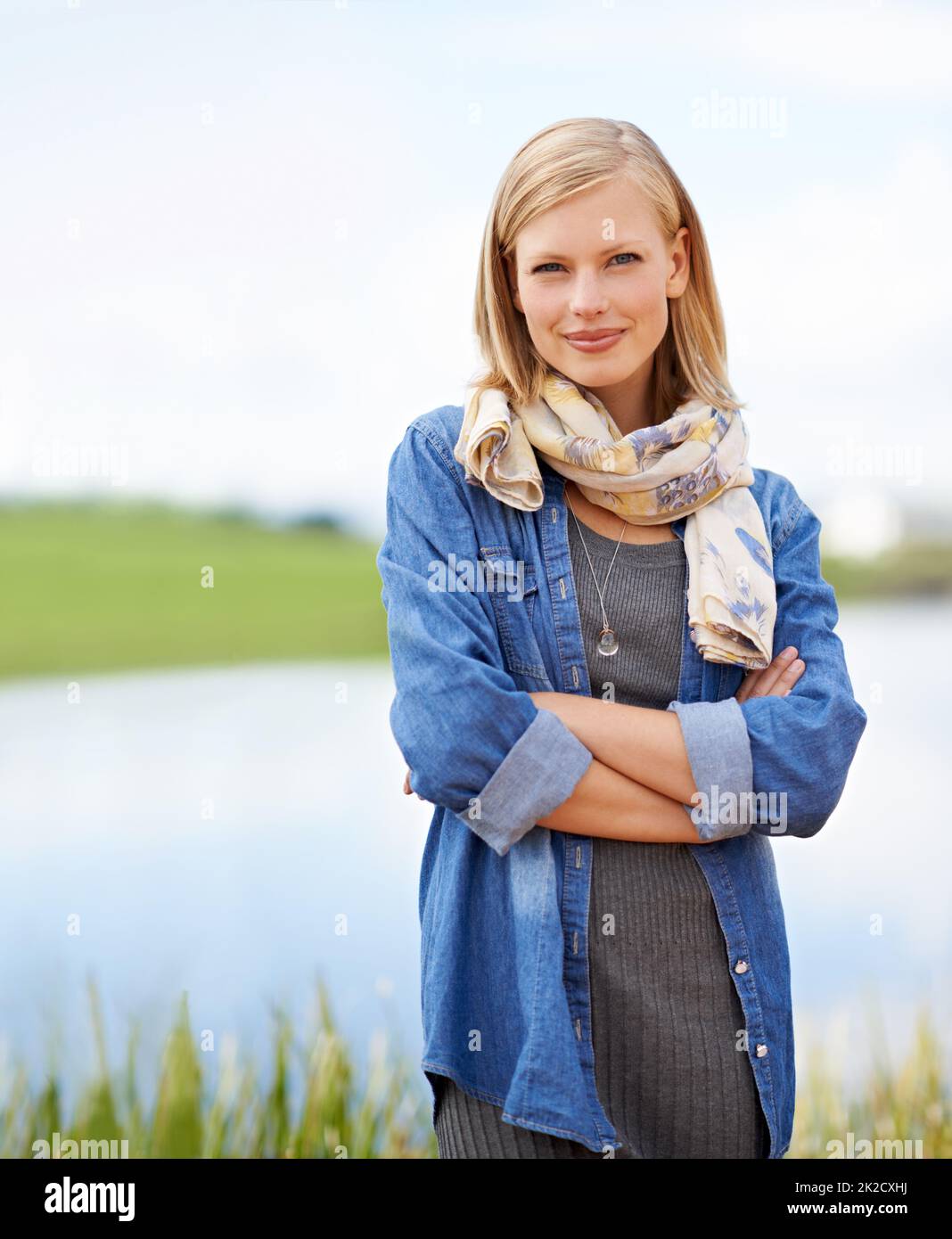Woman standing outdoors hi-res stock photography and images - Alamy