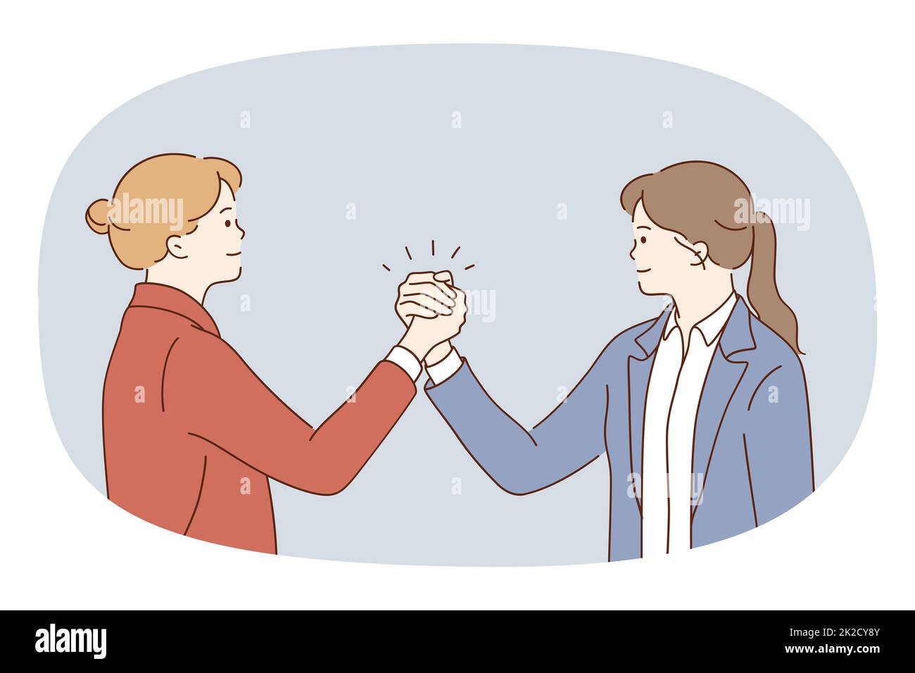 Happy businesswomen hold hands having competition Stock Photo