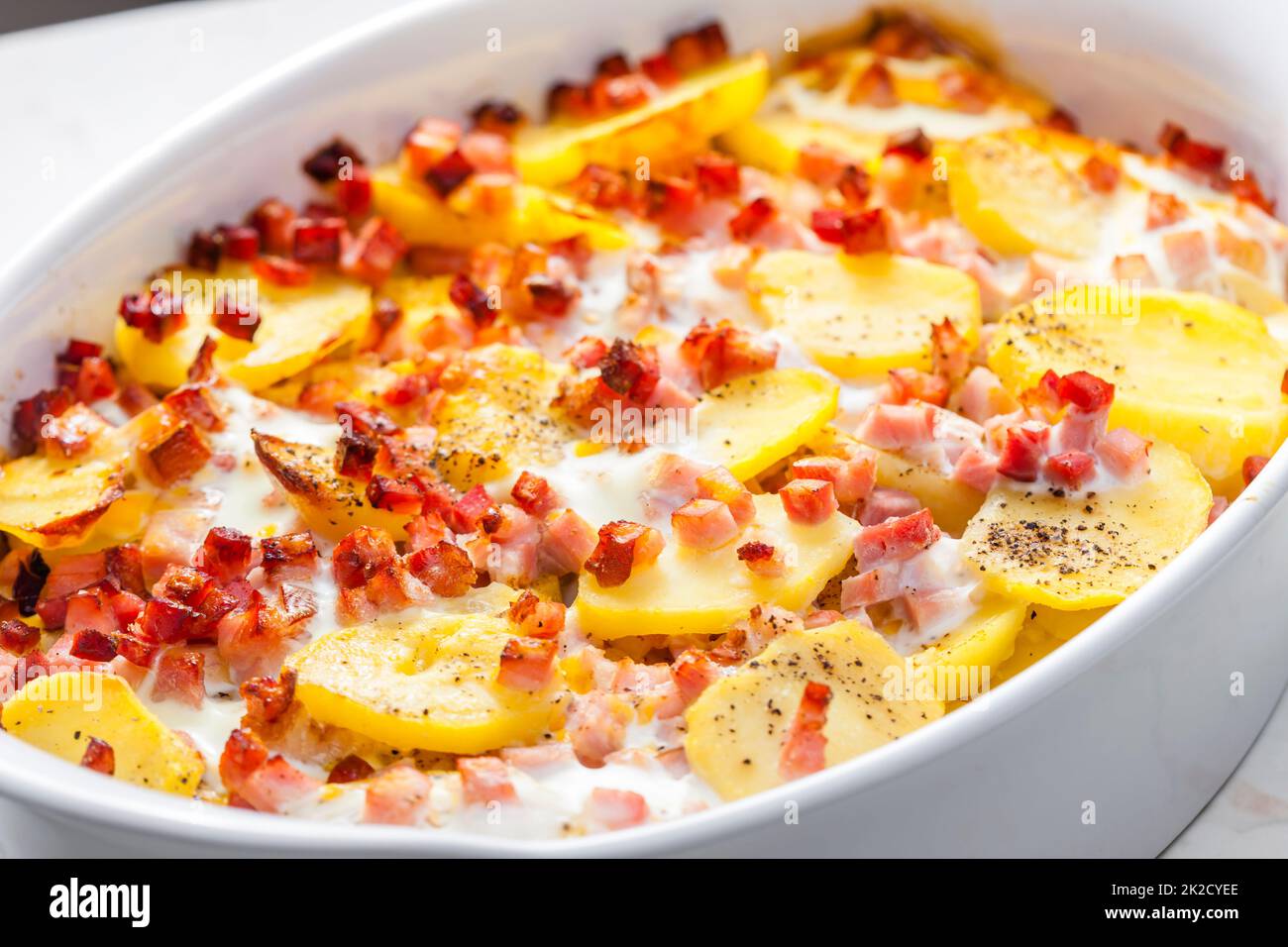 baked potatoes with bacon and eggs Stock Photo