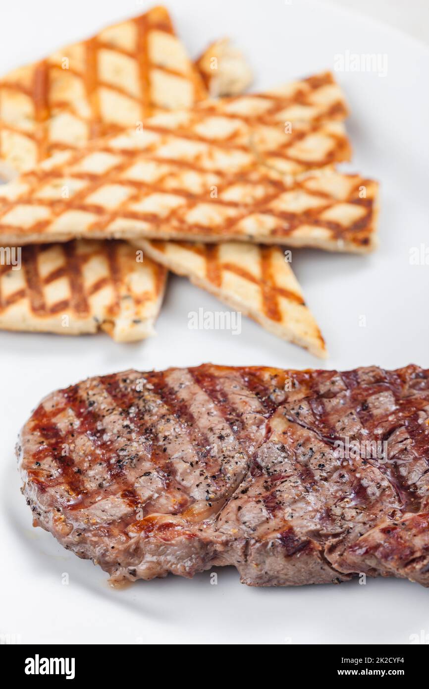 beef steak with grilled pita bread Stock Photo - Alamy
