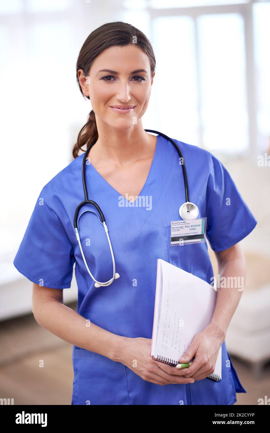 Portrait young nurse in scrubs hi-res stock photography and images - Alamy