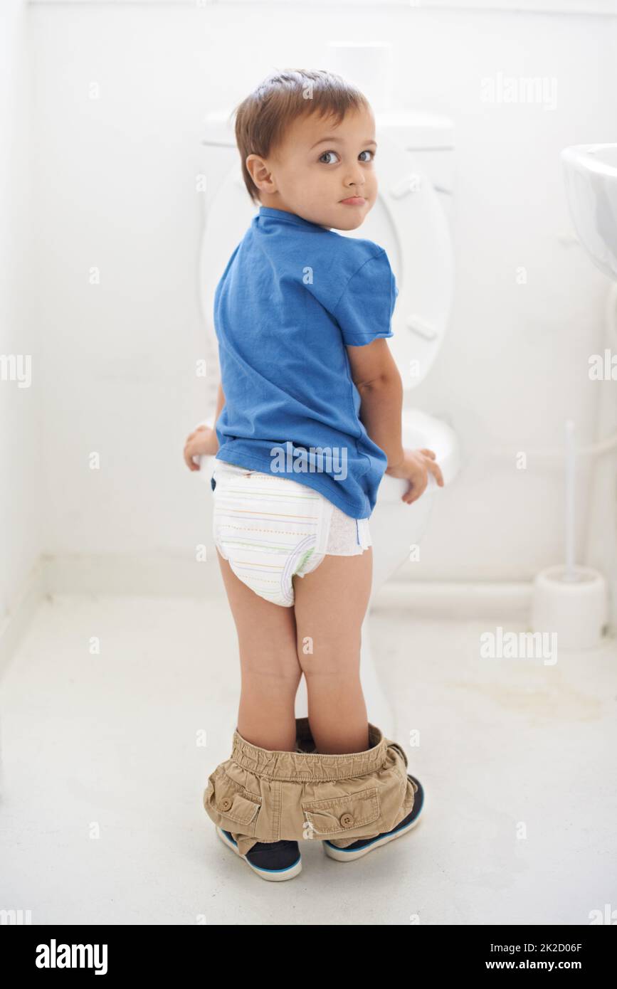 Shot of a young boy being potty trained Stock Photo Alamy