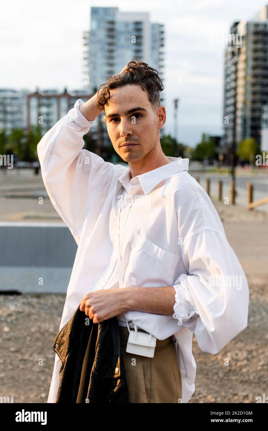 Portrait of a young man in a city hi-res stock photography and images ...