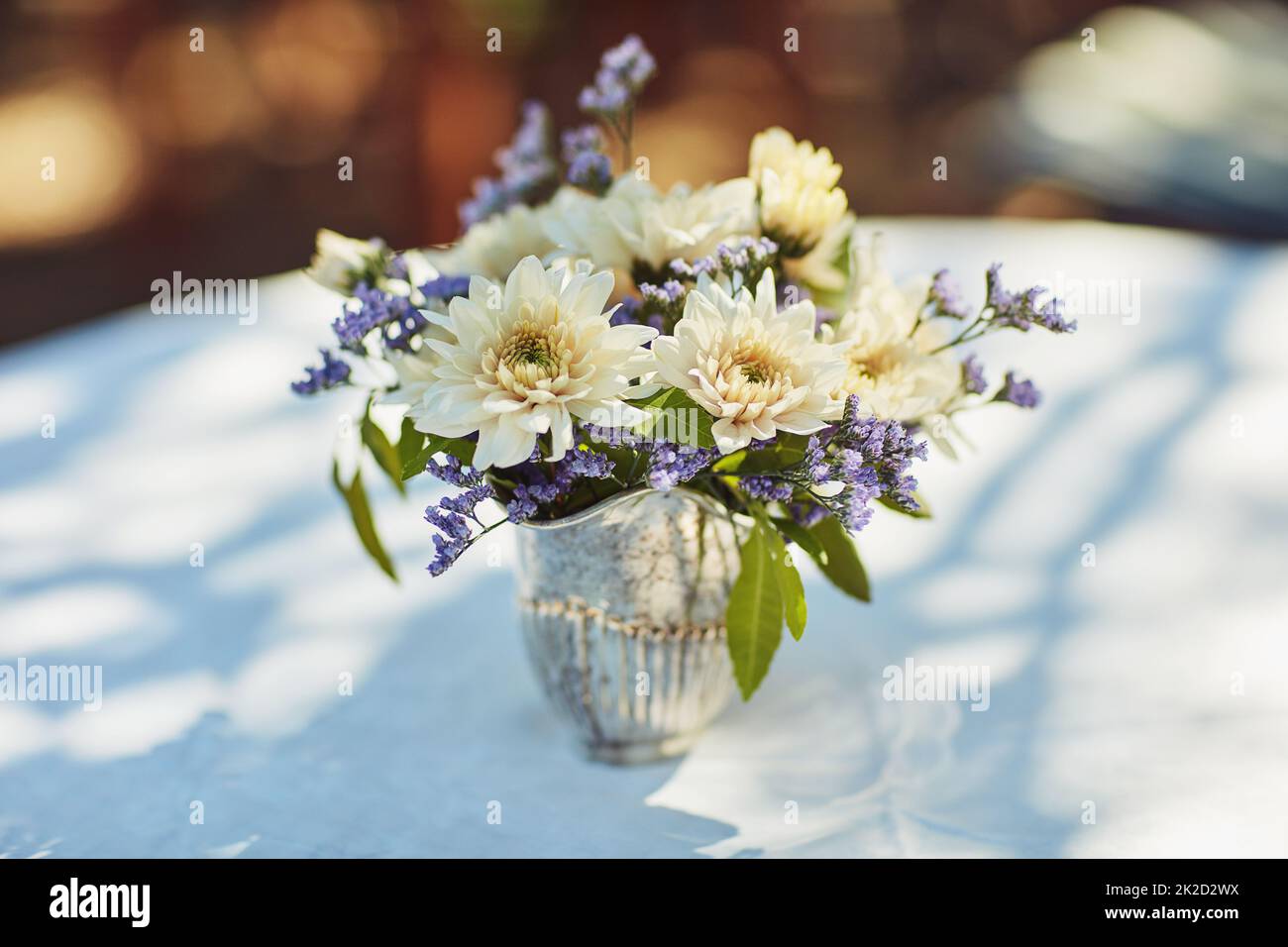Fresh flowers create the perfect ambience for a tea party. Shot of a