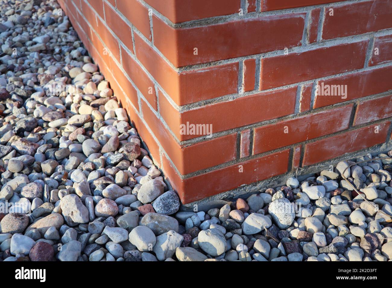 New paving stones along at the corner of the bricks house Stock Photo