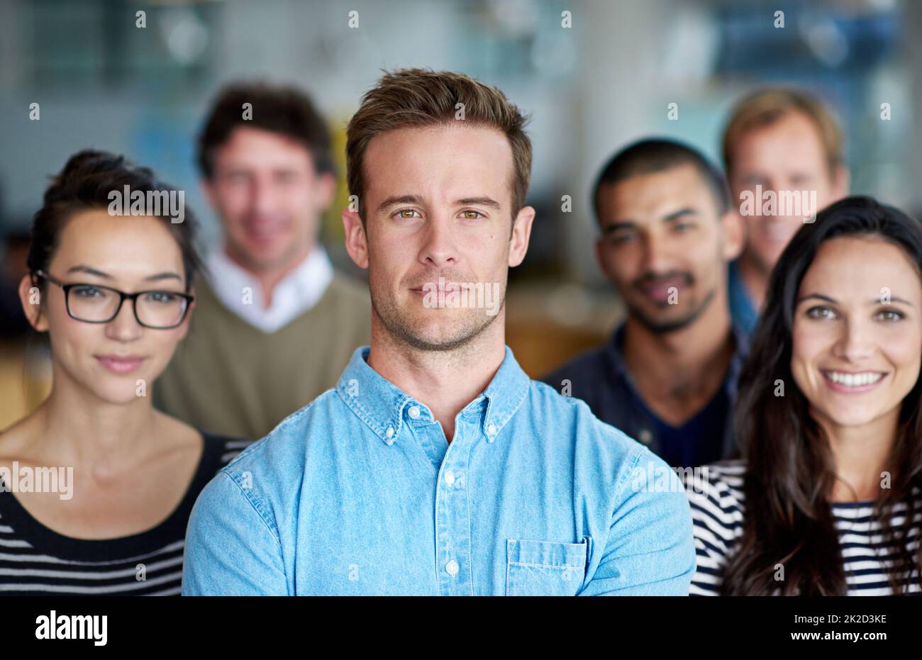 Weve got our goal in sight. A group of diverse staff looking determined and proud. Stock Photo