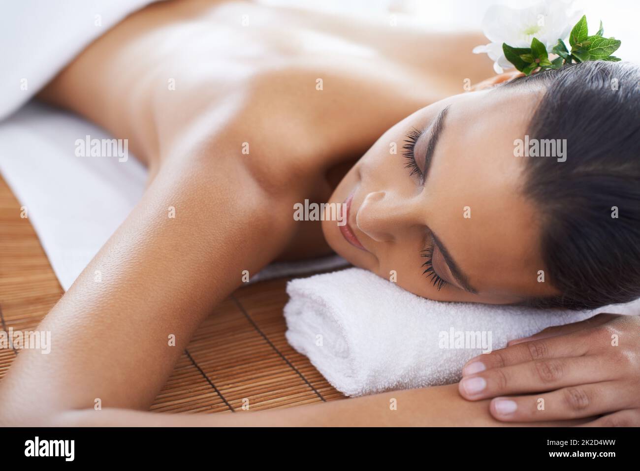 Total stress relief. A young woman lying in a health spa. Stock Photo