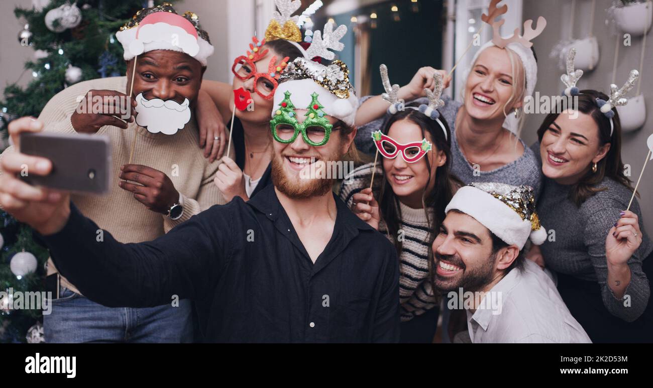 Young women wearing party hats hi-res stock photography and images - Alamy