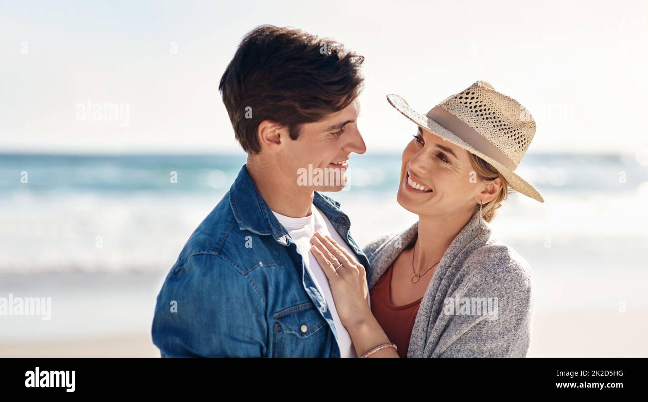 We share a love as deep as the ocean. Shot of a middle aged couple spending the day at the beach. Stock Photo
