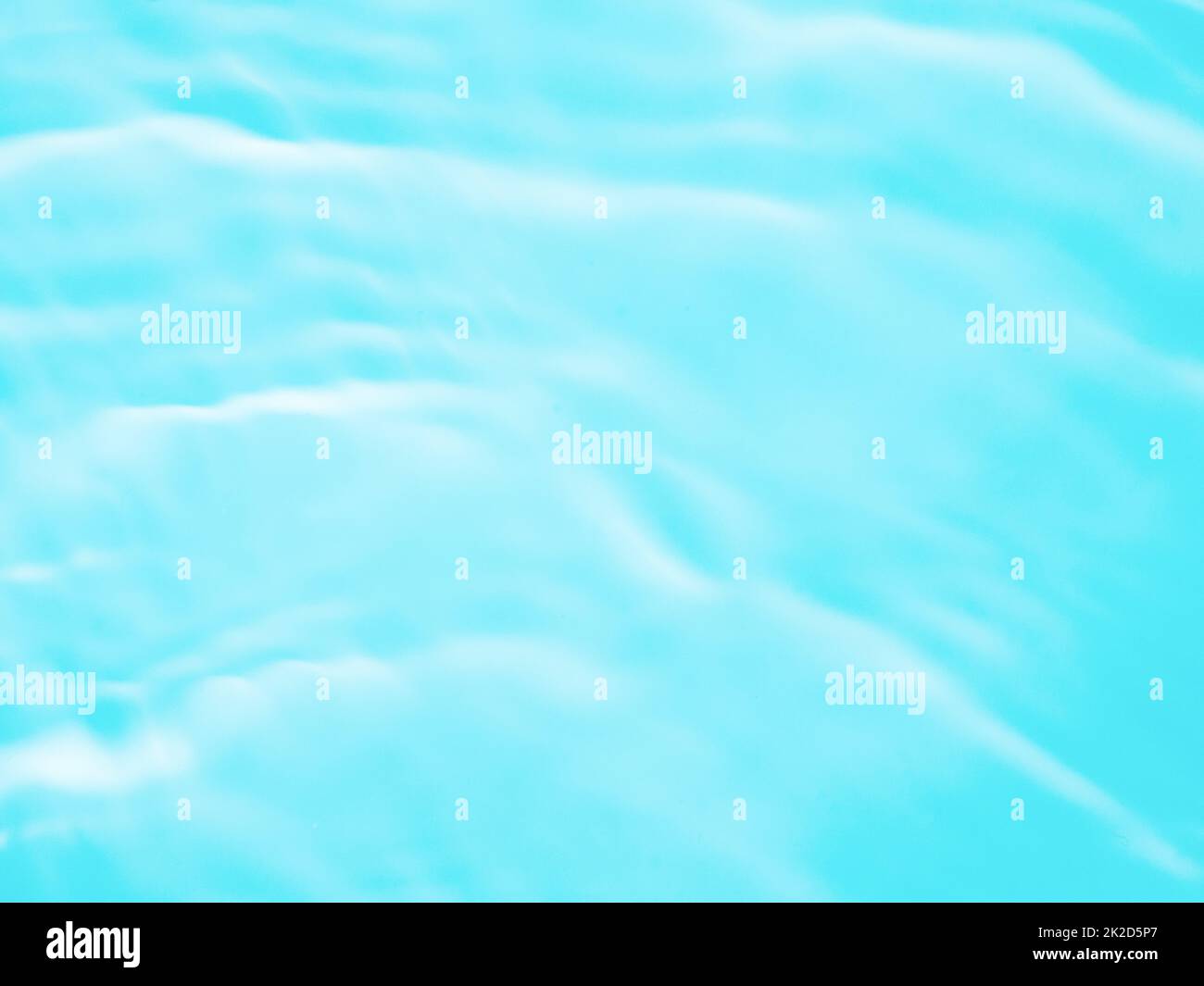 Ripple water texture with shadows on blue Stock Photo