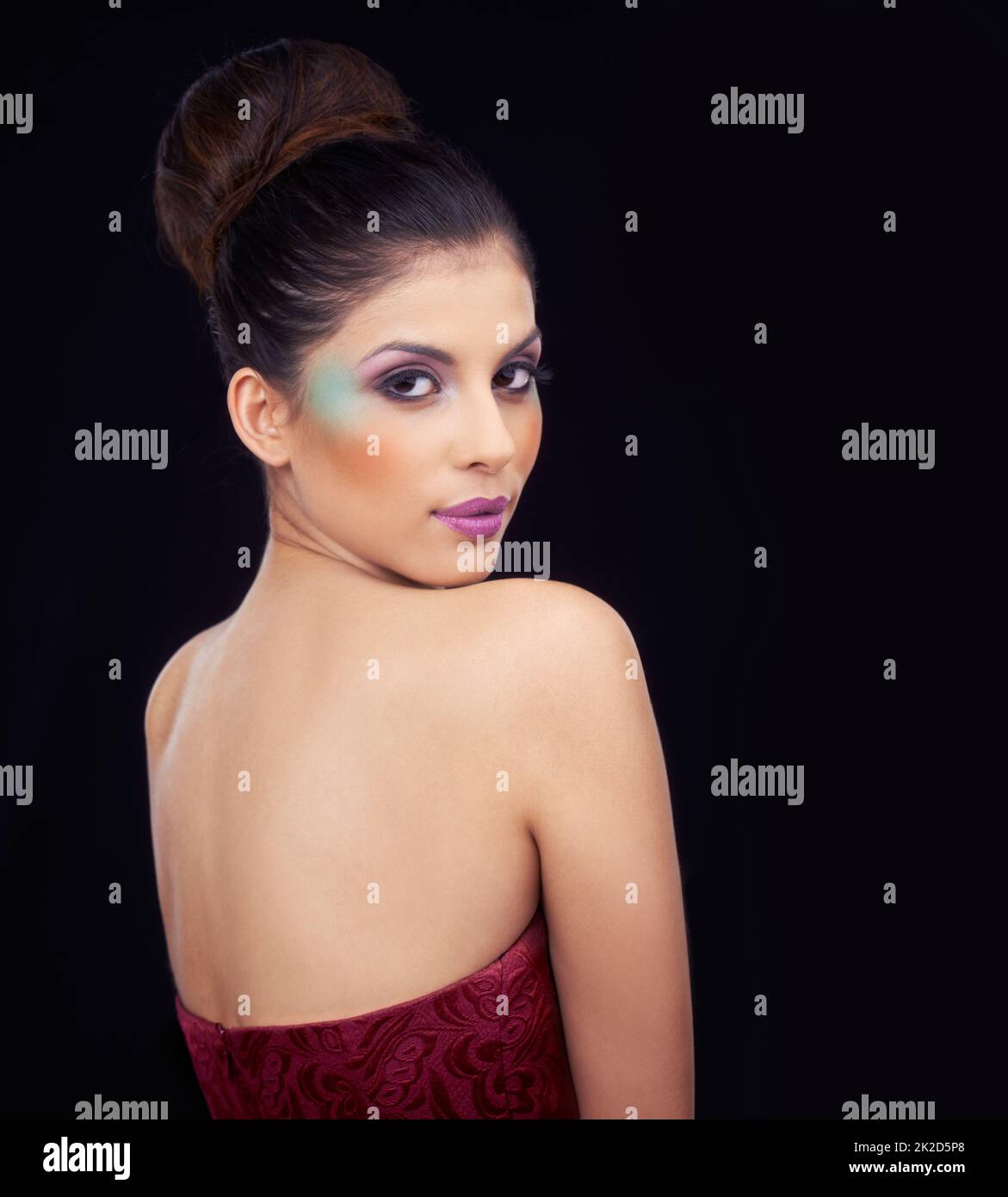 Bold and Beautiful. Head and shoulder shot of a beautiful young woman wearing bold makeup. Stock Photo