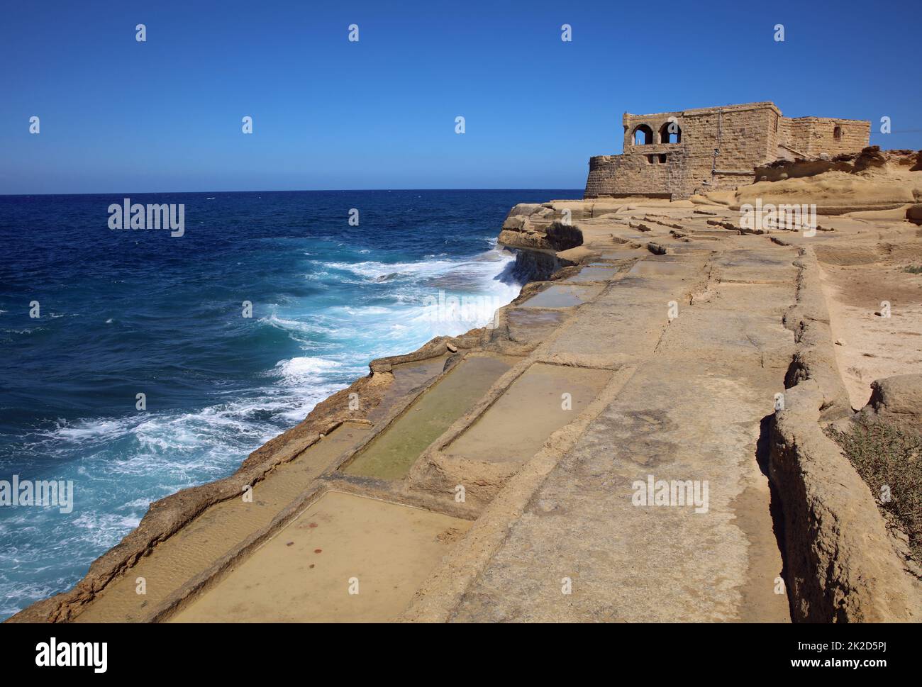 Salt Pans on Xwejni Bay. Gozo. Malta Stock Photo