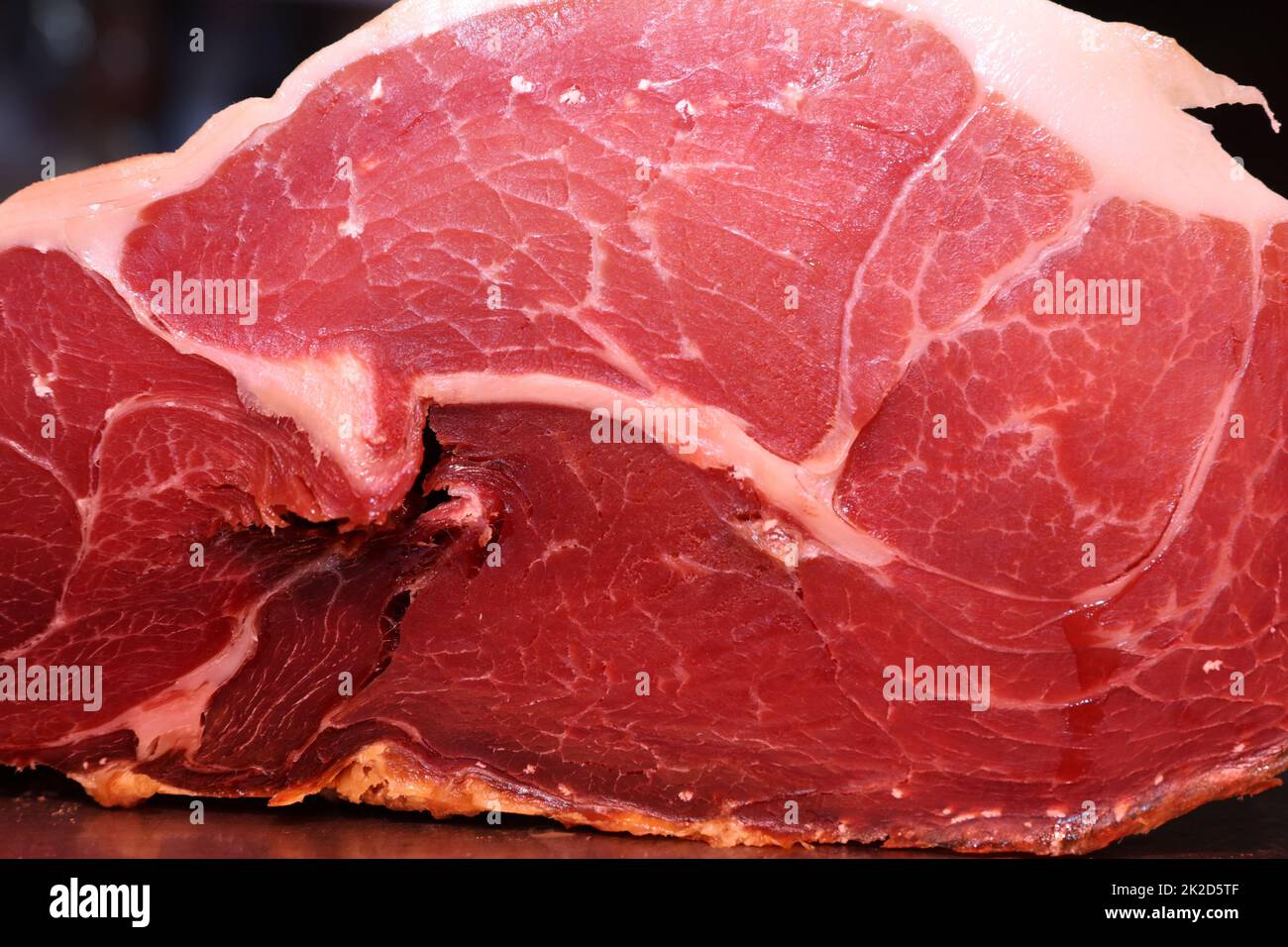 Cured Ham (Jamon Iberico) on Market in Madrid. Spain Stock Photo