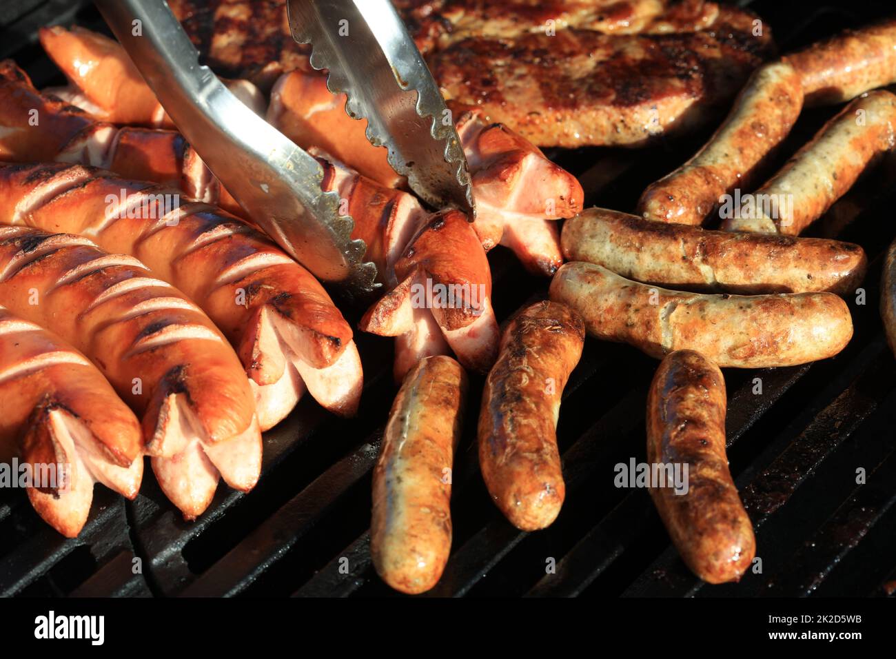 German Bratwurst on Barbecue Grill Stock Photo
