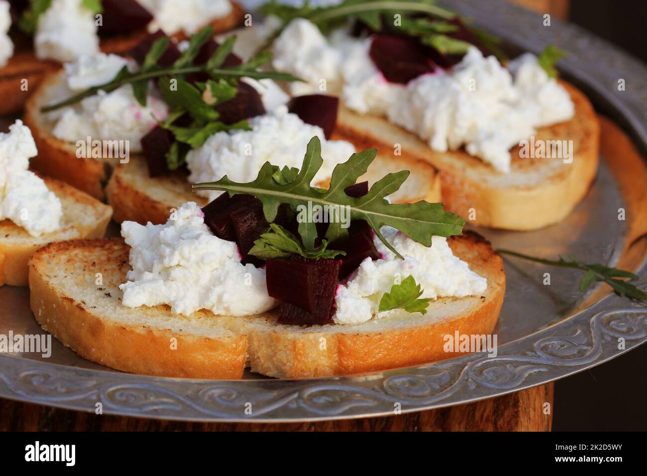 Bruschetta with beet, feta and ruccola. Healthy eating, vegetarian food ...