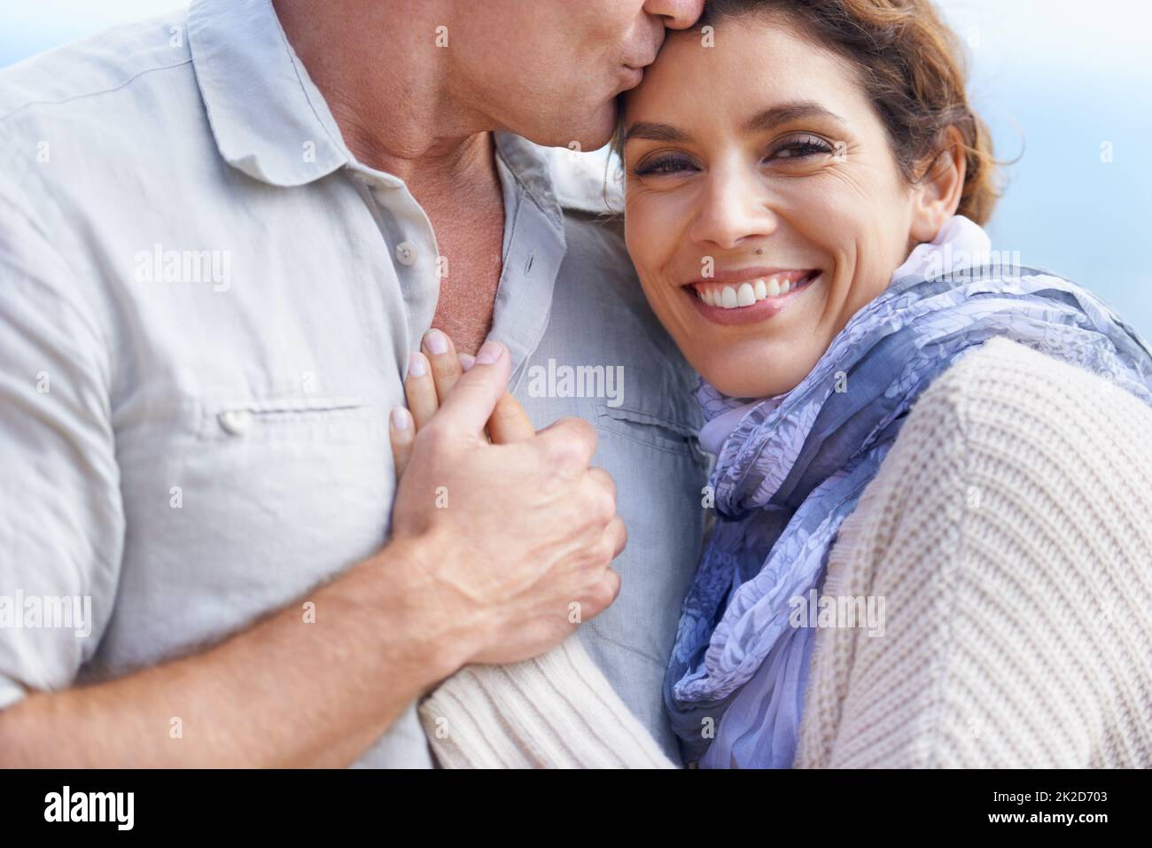 Hes the love of my life. Cropped portrait of mature woman resting her head on her husbands chest. Stock Photo