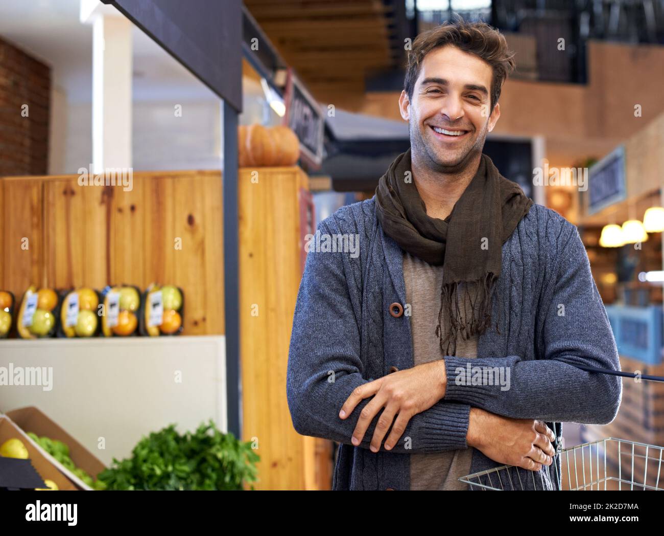 I love shopping for produce. Portrai tof a young man shopping in a