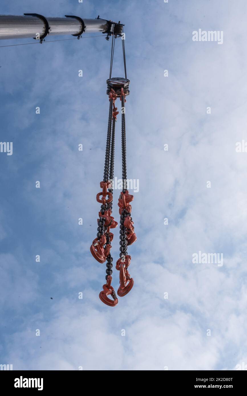 Construction crane with load hook and carabiner - construction machinery and construction industry Stock Photo