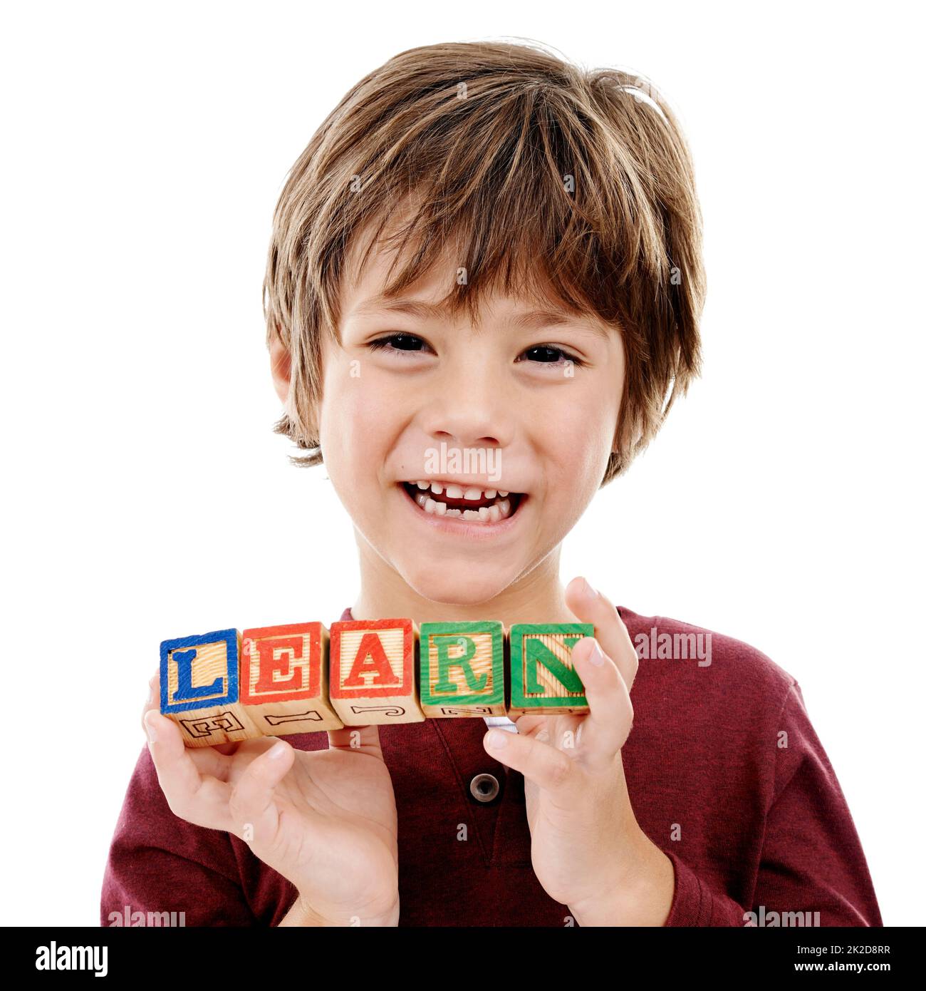 Play is the highest form of learning. Studio shot of a cute little boy holding building blocks