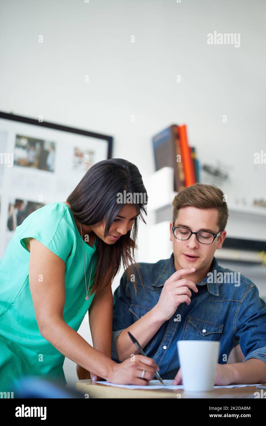 I like that idea, lets run with. two designers working together on a project. Stock Photo