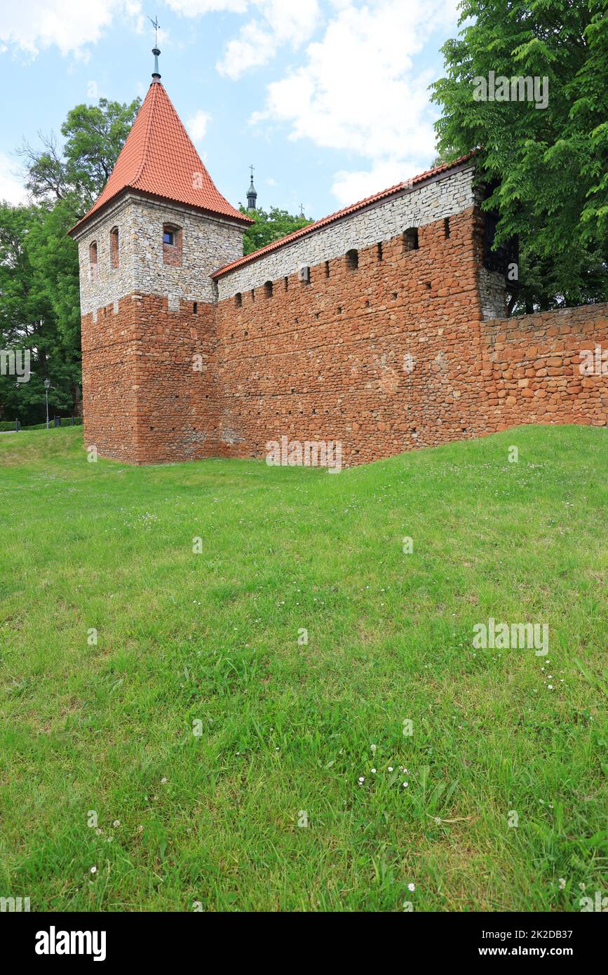 A tower and a fragment of city walls from the 14th century near Krakow, Olkusz, Poland Stock Photo