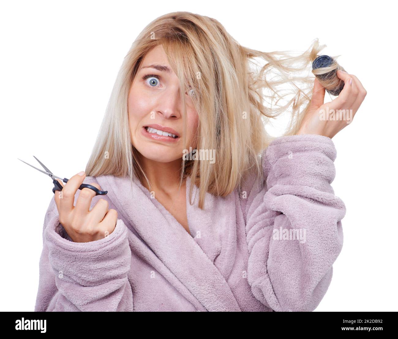 Its going to be a bad hair day. Studio portrait of a young woman having a bad hair day. Stock Photo