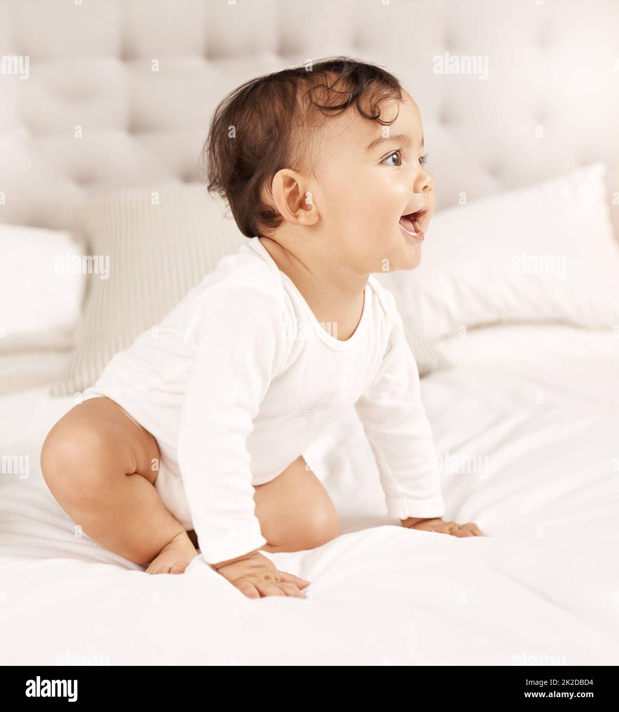 Shell turn any frown upside down. Shot of an adorable baby girl sitting