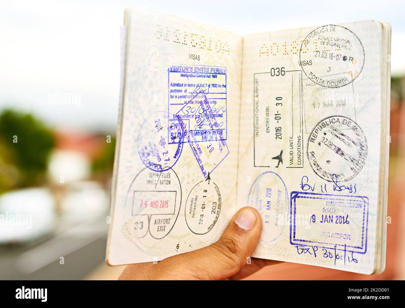 Every stamp tells a story. Shot of an unidentifiable young man holding