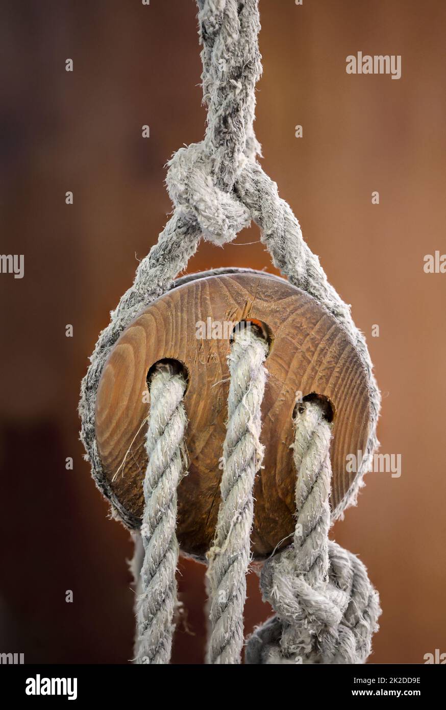 A tension pulley made of wood, or also called three-hole virgin Stock ...