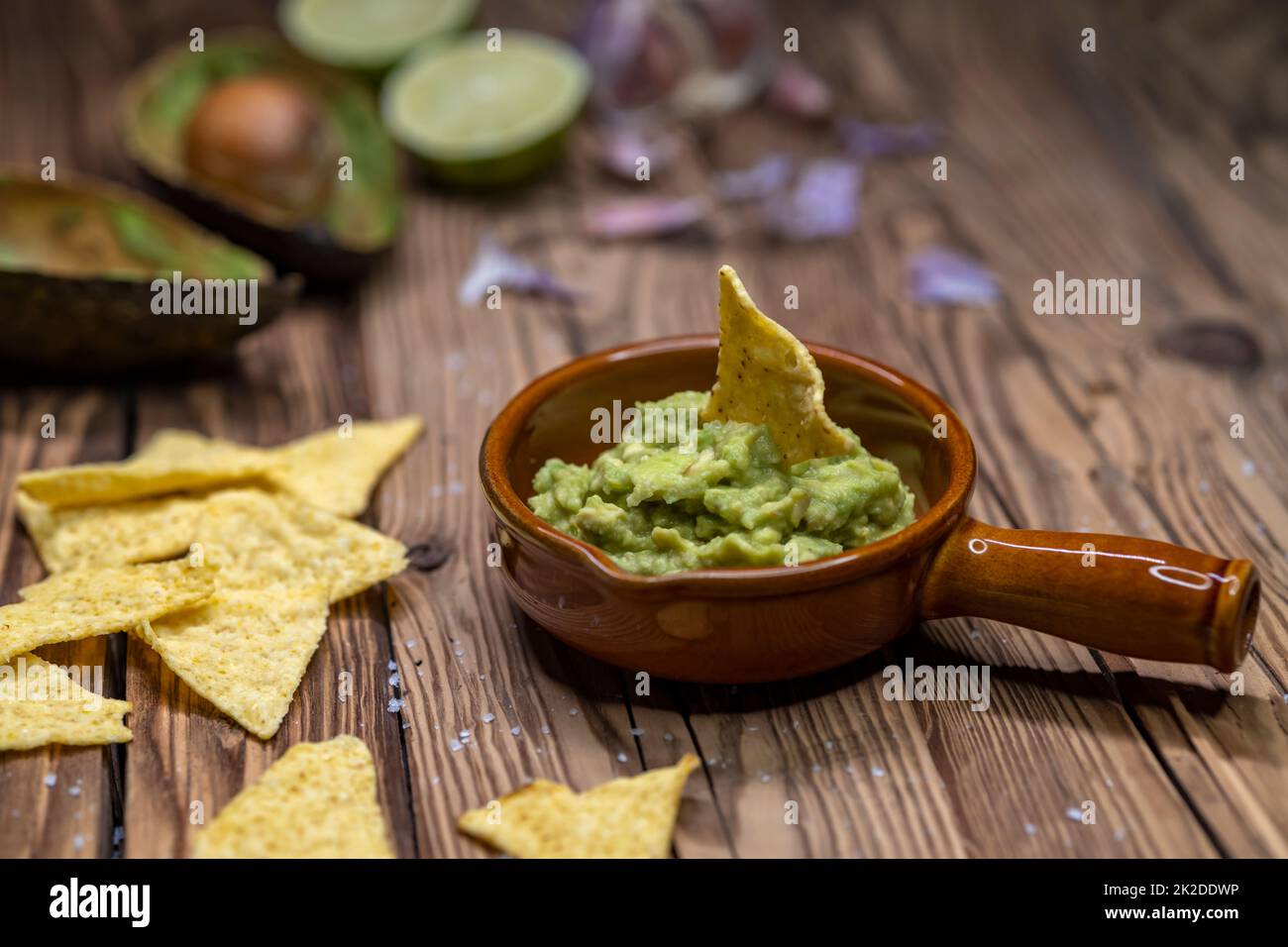 avocado dip flavored with garlic, chili, pepper, and lime juice with