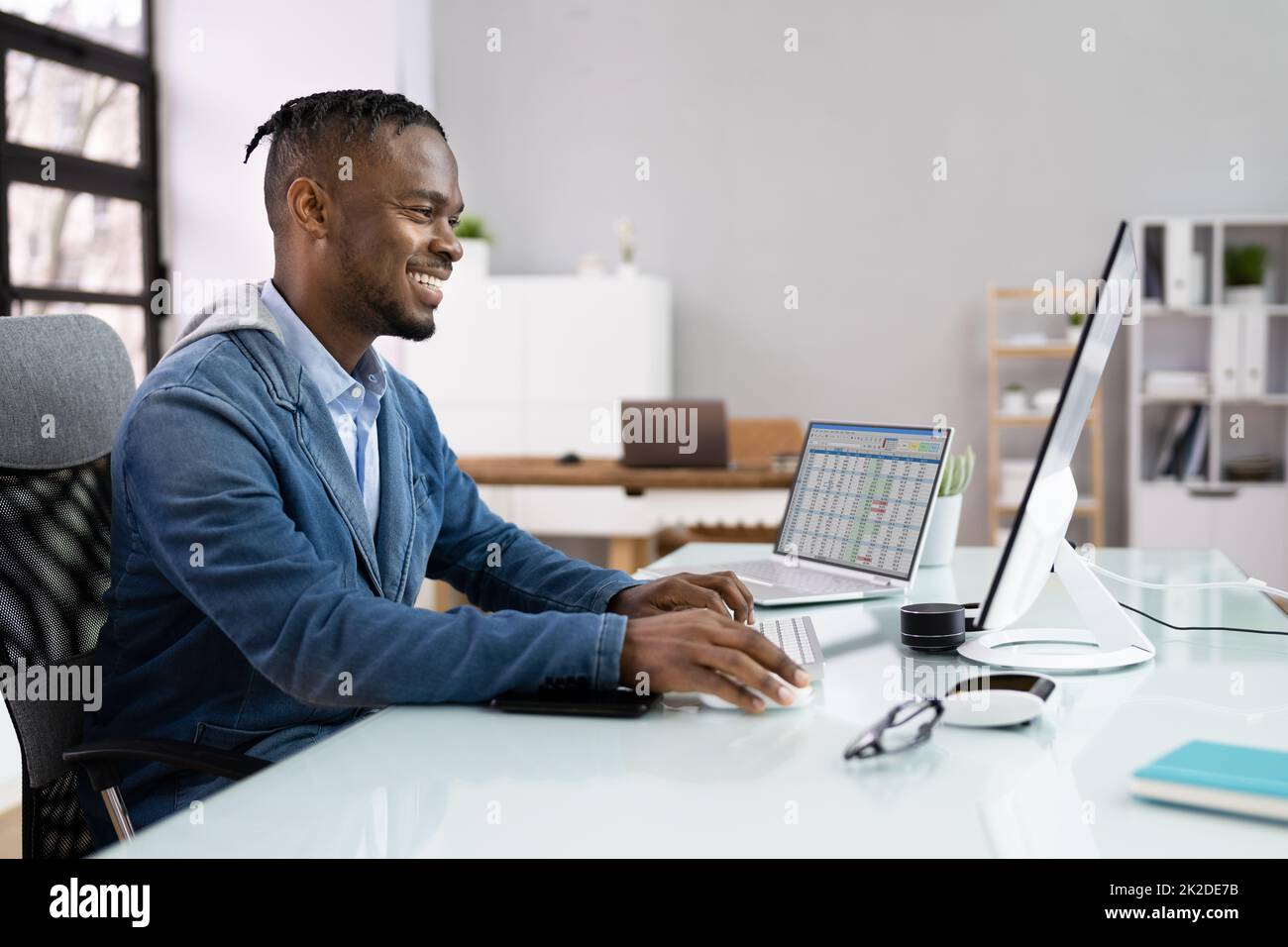 African american businessman using desktop hi-res stock photography and ...