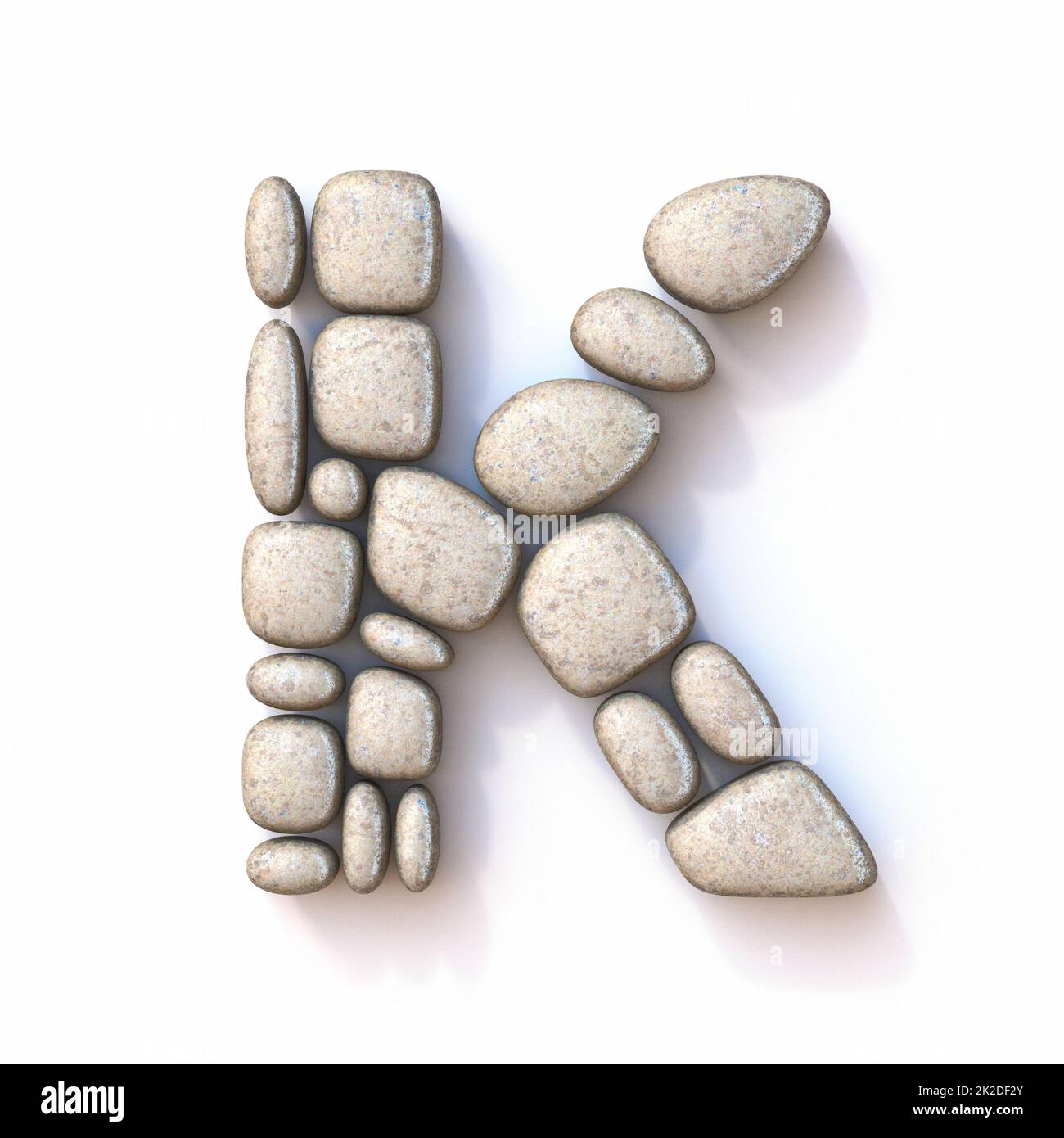 Pebble font Letter K 3D Stock Photo