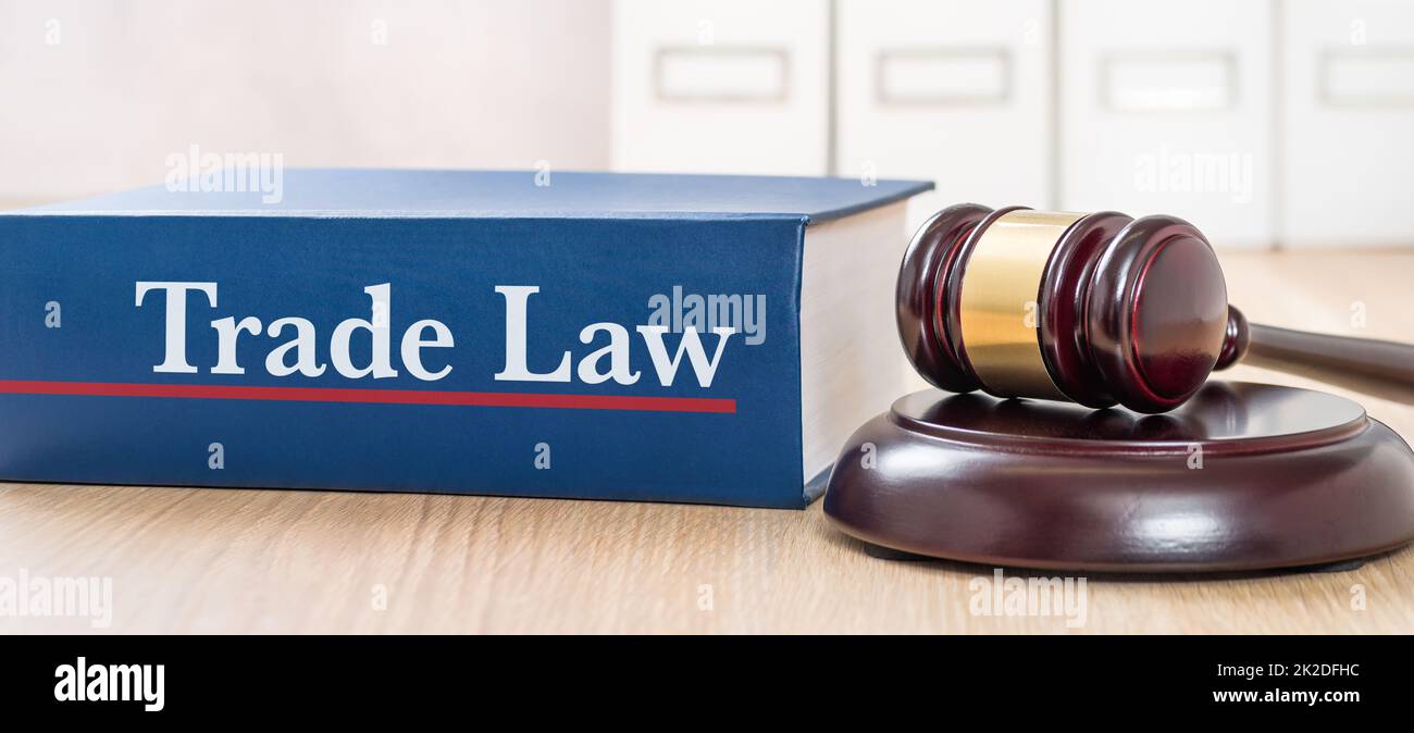 A law book with a gavel  - Trade law Stock Photo