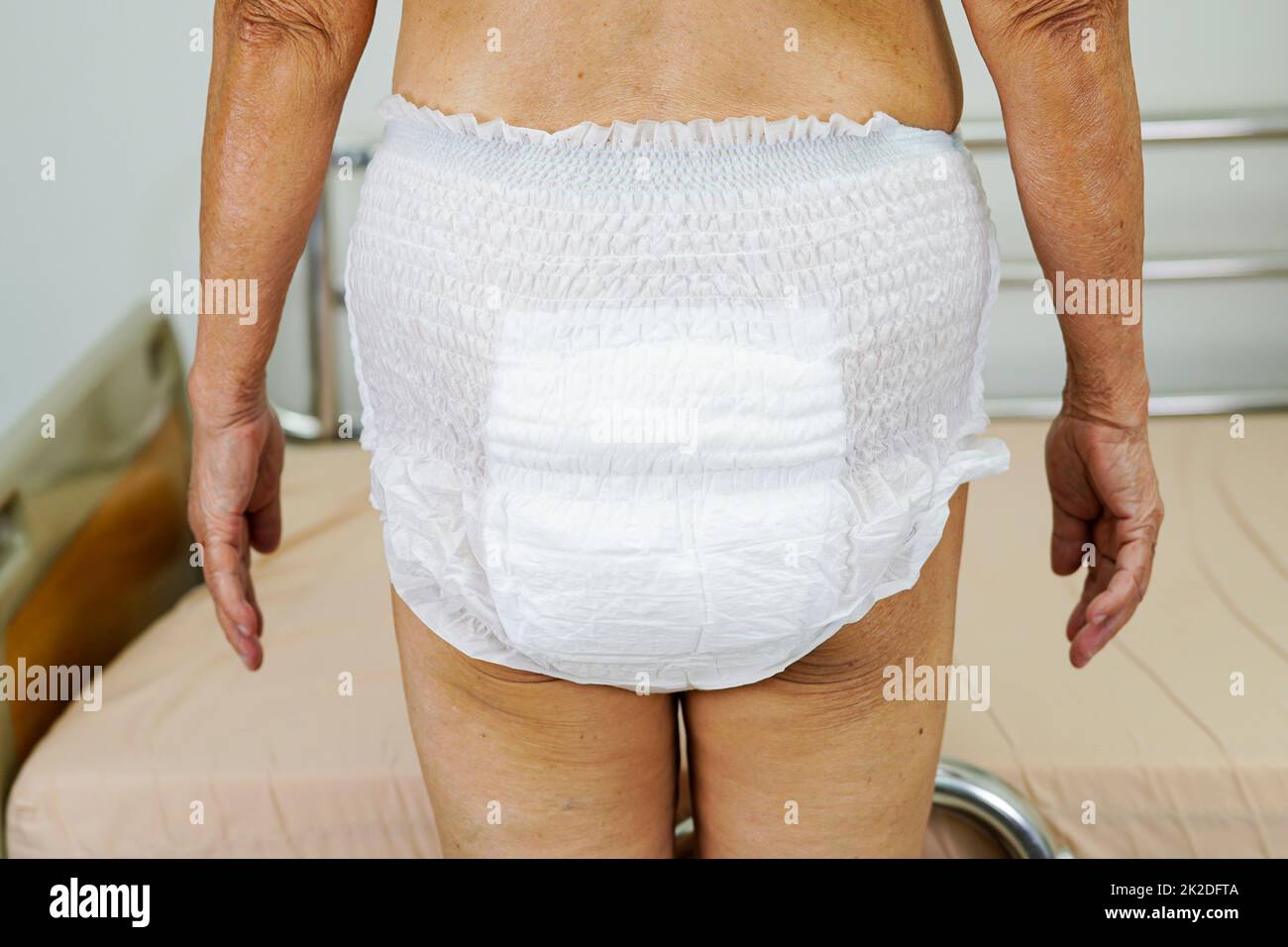 Asian senior woman patient wearing adult incontinence diaper pad in ...