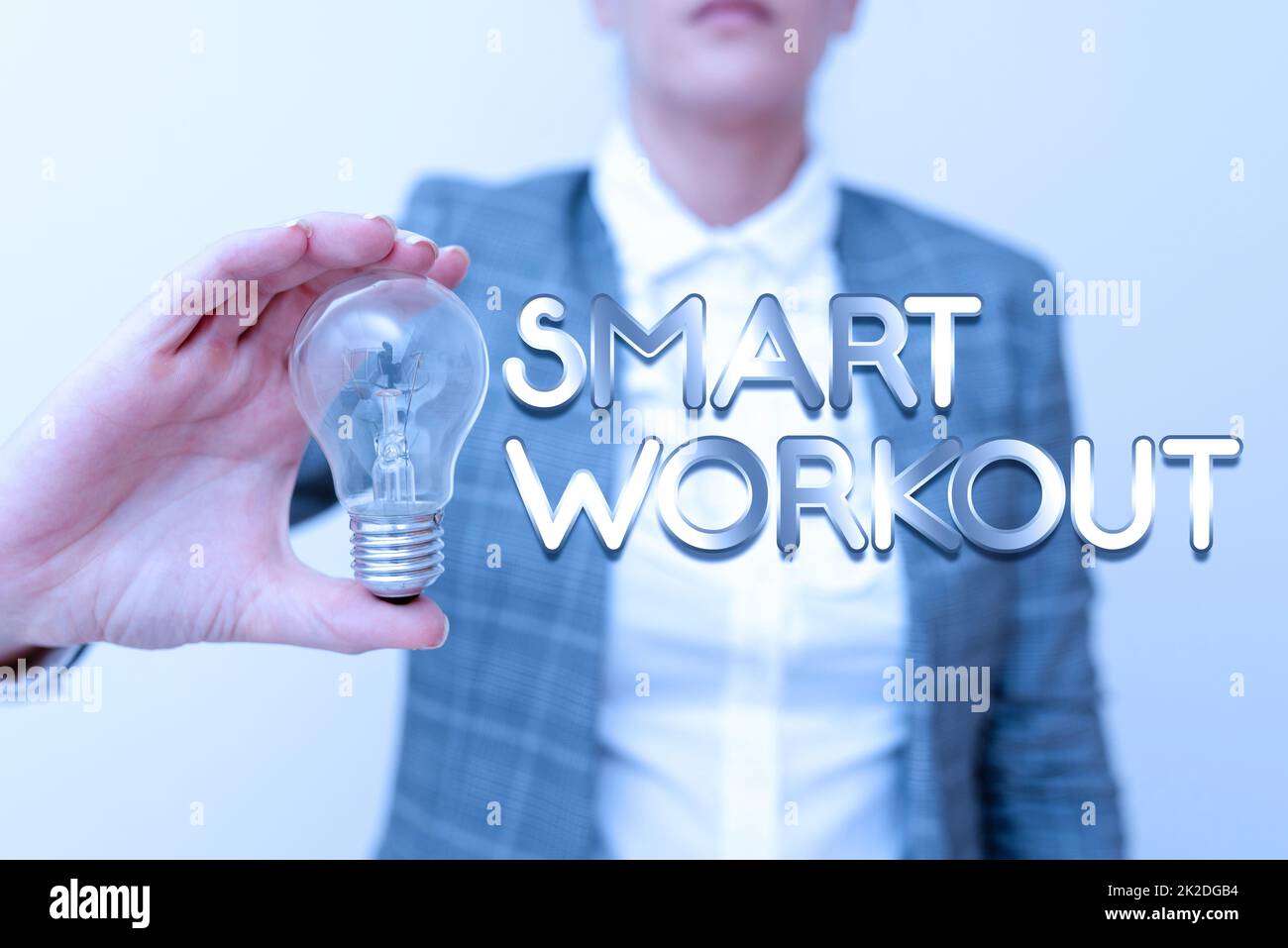Inspiration showing sign Smart Workout. Business idea set a goal that maps out exactly what need to do in being fit Lady in business outfit holding lamp presenting new technology ideas Stock Photo
