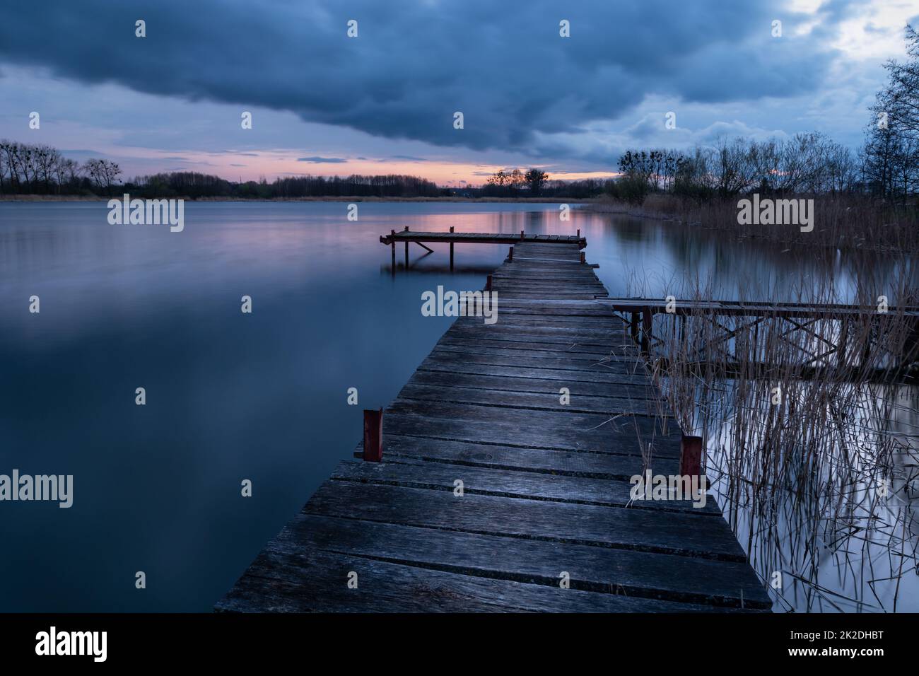A wooden pier on a water reservoir in Stankow Stock Photo