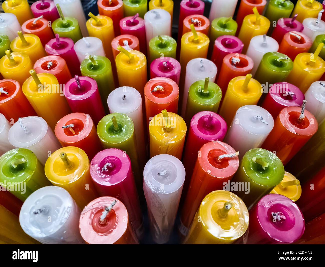 Many colorful torches for sale in a store. Stock Photo