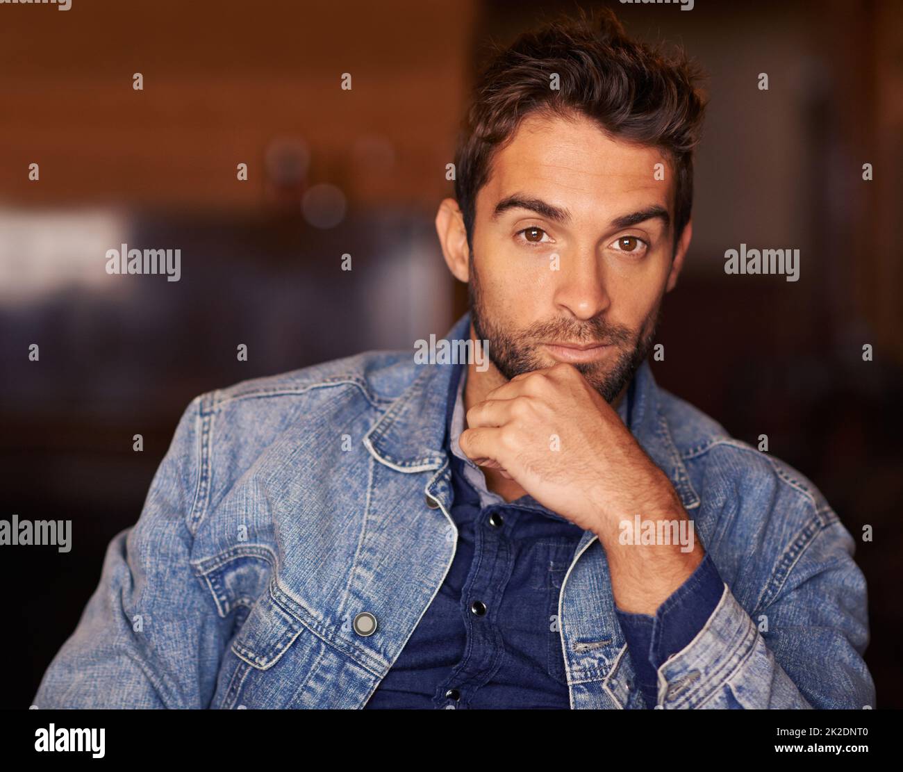 Whats on your mind. Portrait of a handsome young man wearing denim clothing. Stock Photo
