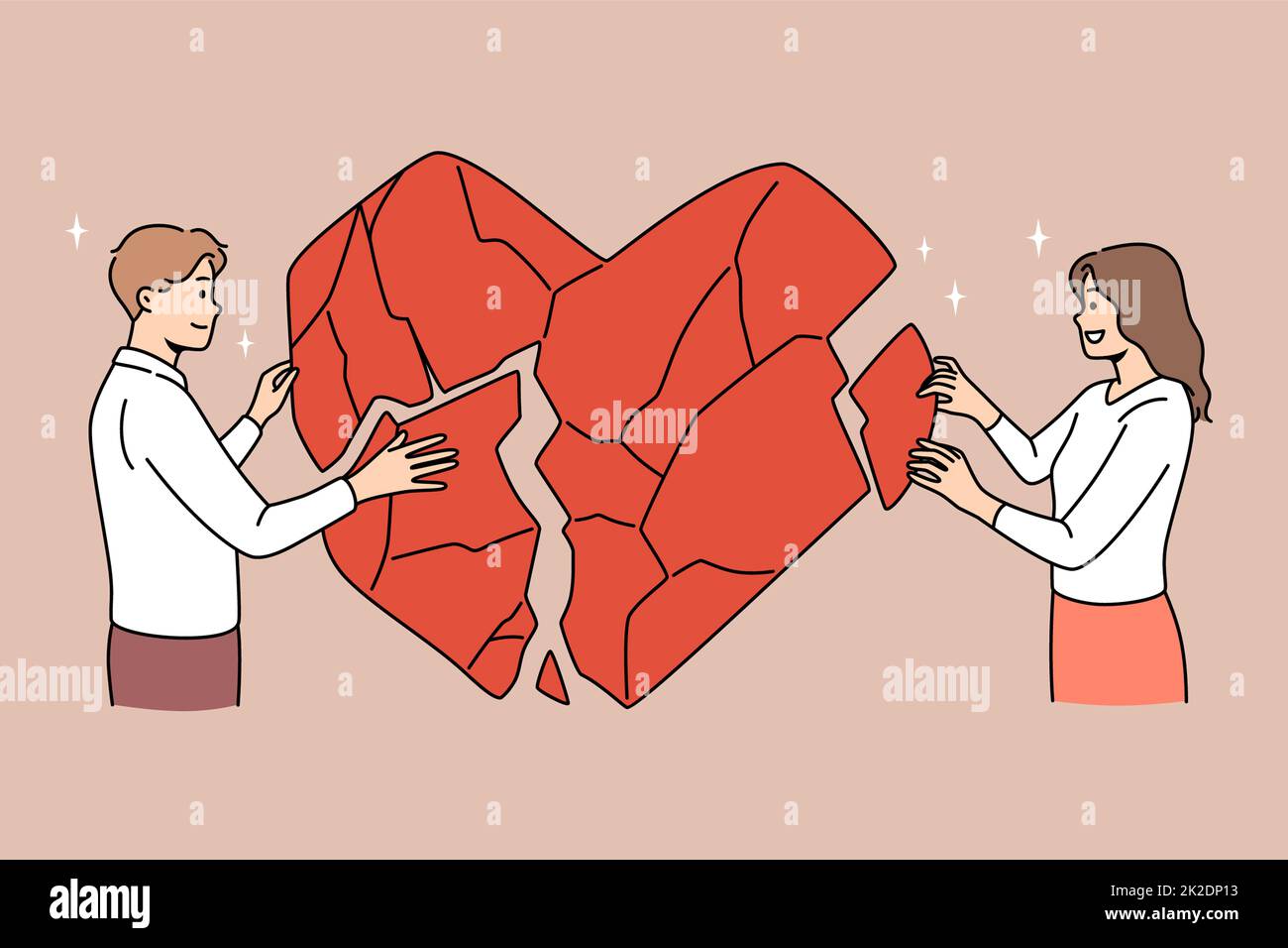 Couple connect huge heart pieces together Stock Photo
