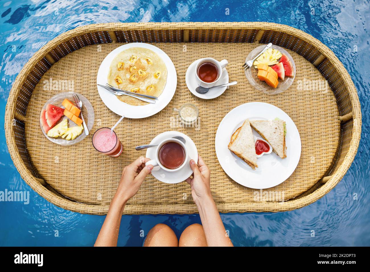Floating breakfast in the swimming pool Stock Photo Alamy