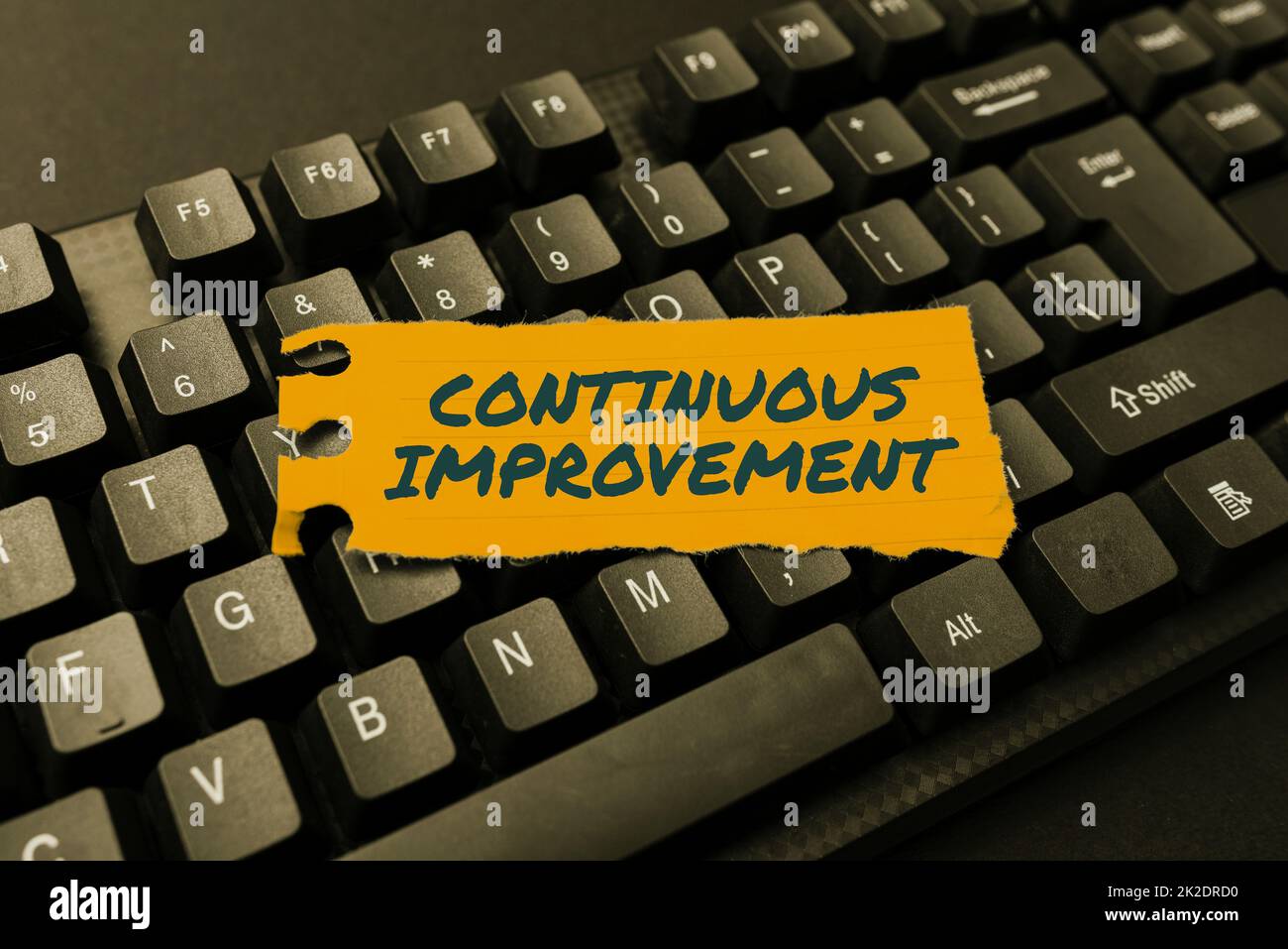 Conceptual caption Continuous Improvement. Business overview making small consistent improvements over time Typing New Edition Of Informational Ebook, Creating Fresh Website Content Stock Photo