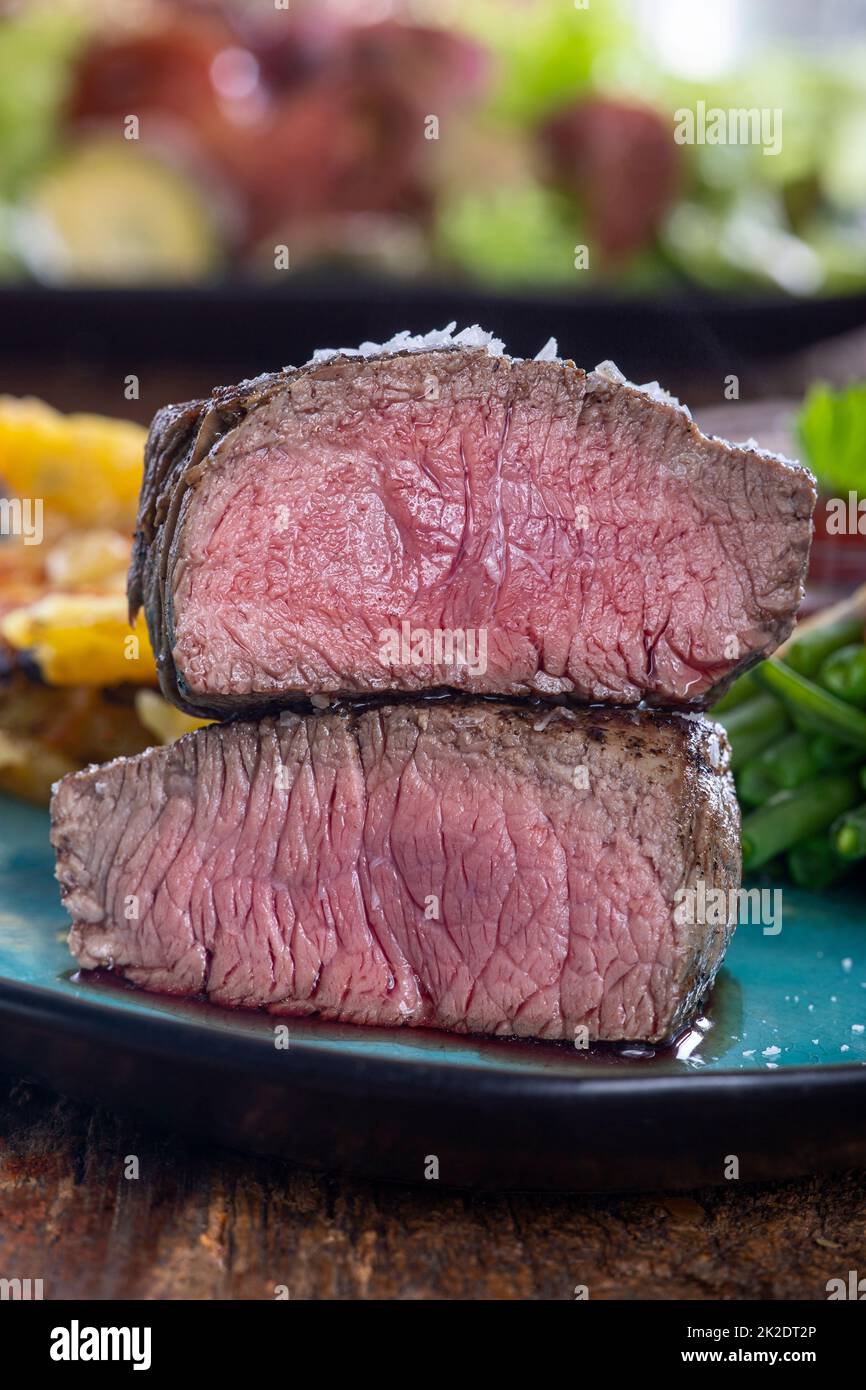 steak with potato gratin Stock Photo - Alamy