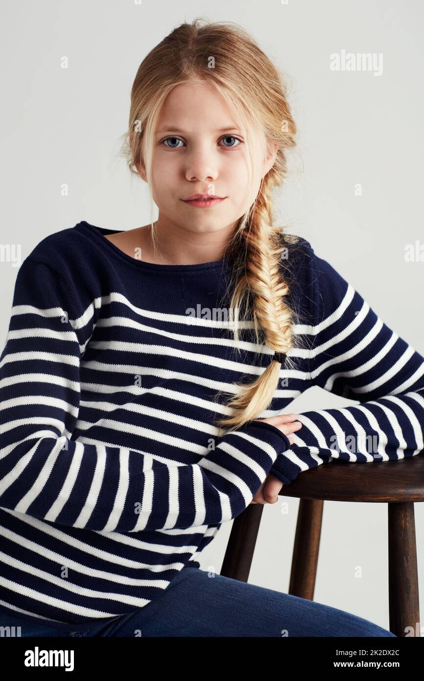 Preteen girl sitting in chair hi-res stock photography and images - Alamy