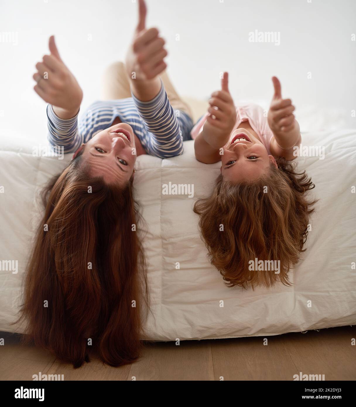Hanging off the bed hi-res stock photography and images - Alamy
