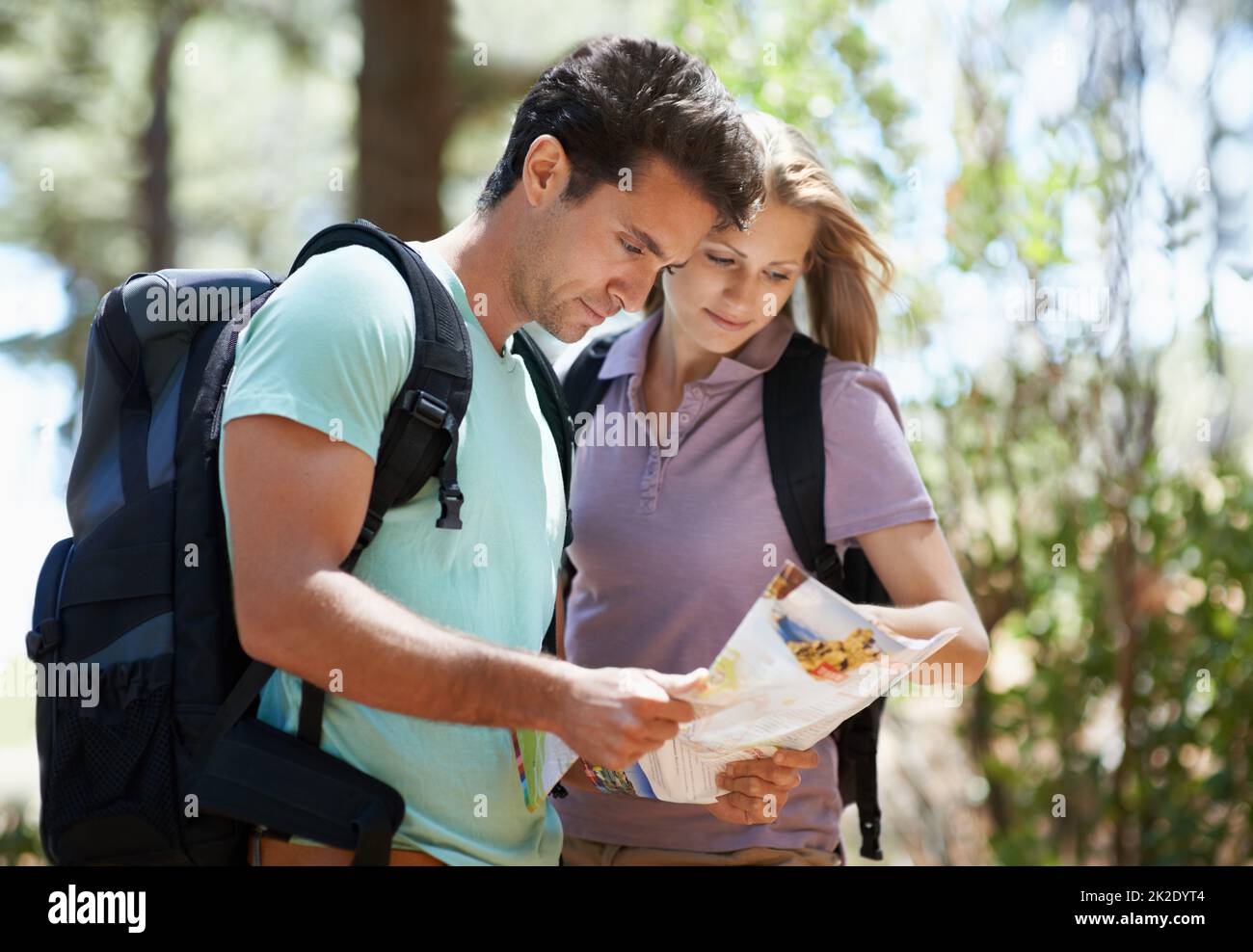 Young couple hike map hi-res stock photography and images - Alamy