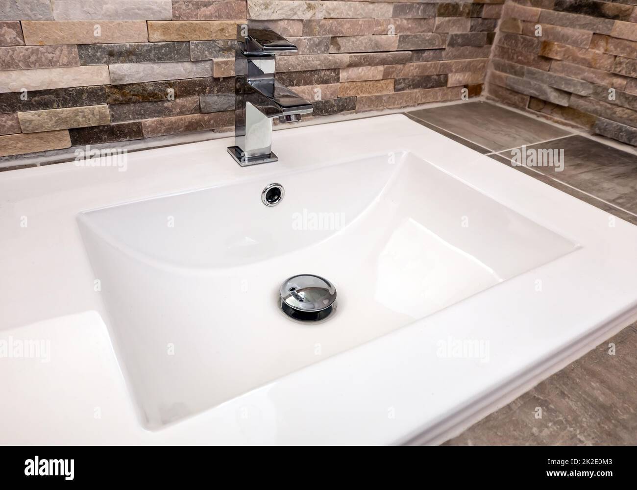 Modern Bathroom sink with with faucet in detail Stock Photo
