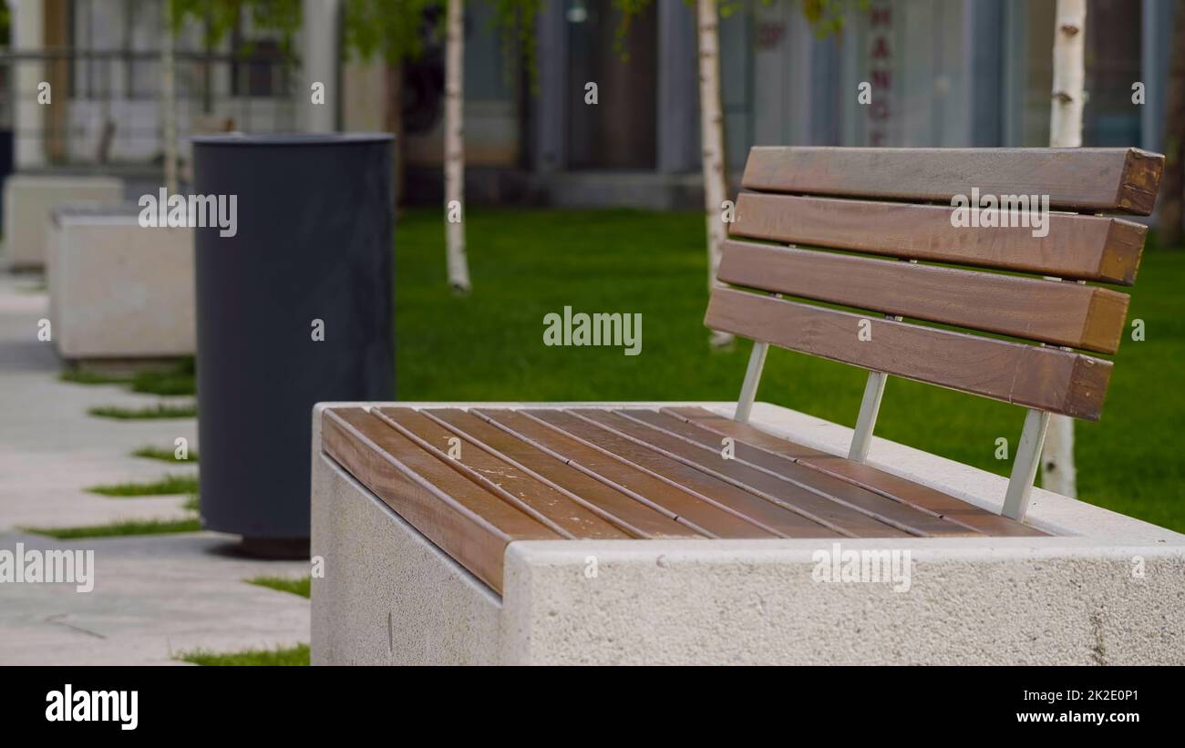 Bank in the park, trash can, city park Stock Photo