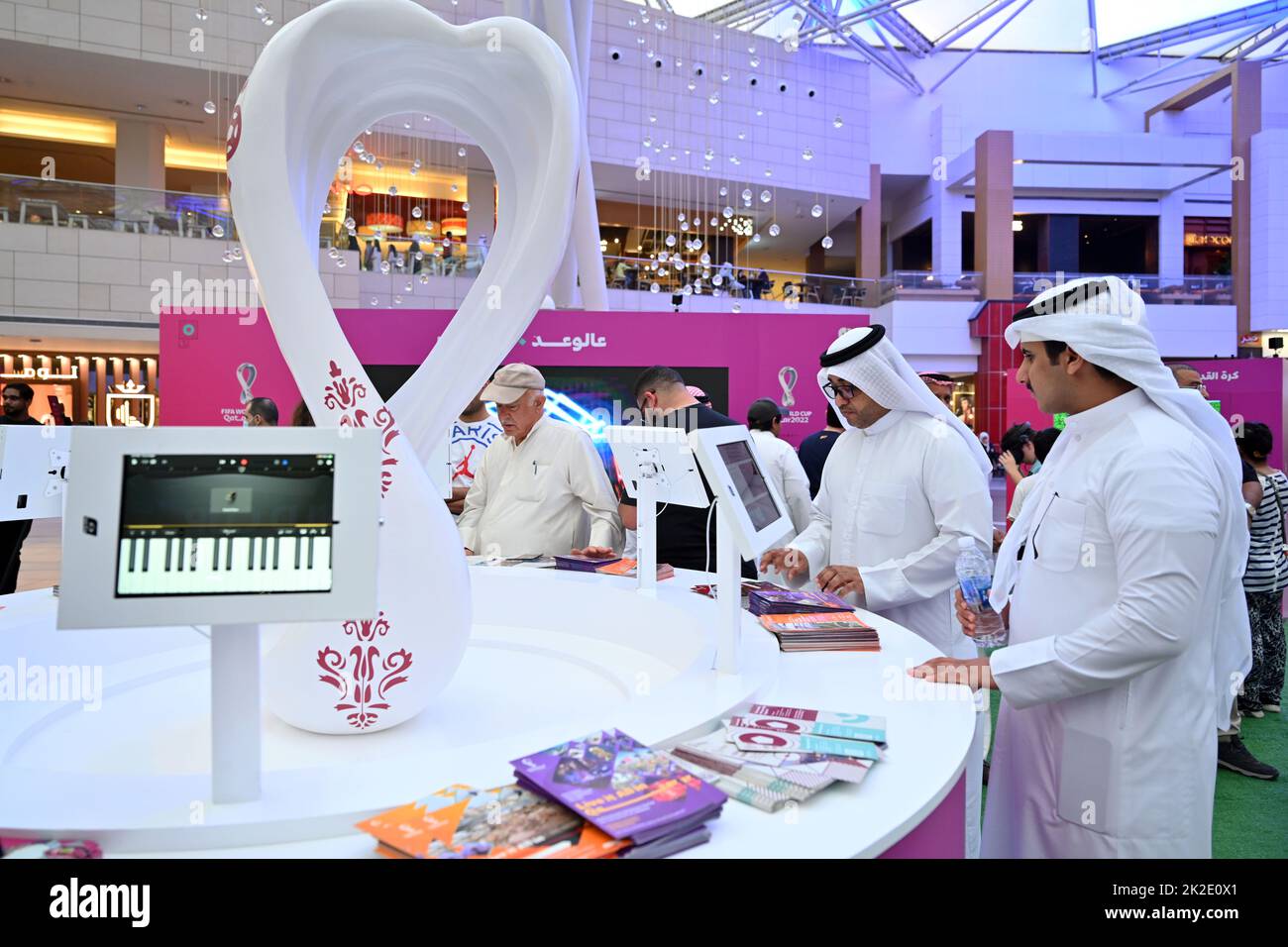 Kuwait City, Kuwait. 22nd Sep, 2022. People visit an exhibition booth of the FIFA World Cup 2022 of Qatar, in Al Farwaniyah Governorate, Kuwait, Sept. 22, 2022. Credit: Asad/Xinhua/Alamy Live News Stock Photo