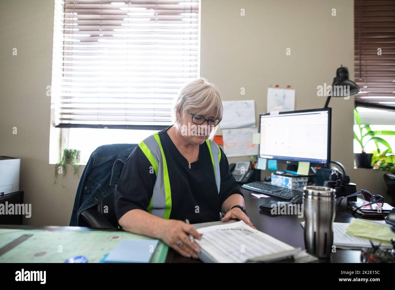 Distribution warehouse owner working in office Stock Photo Alamy
