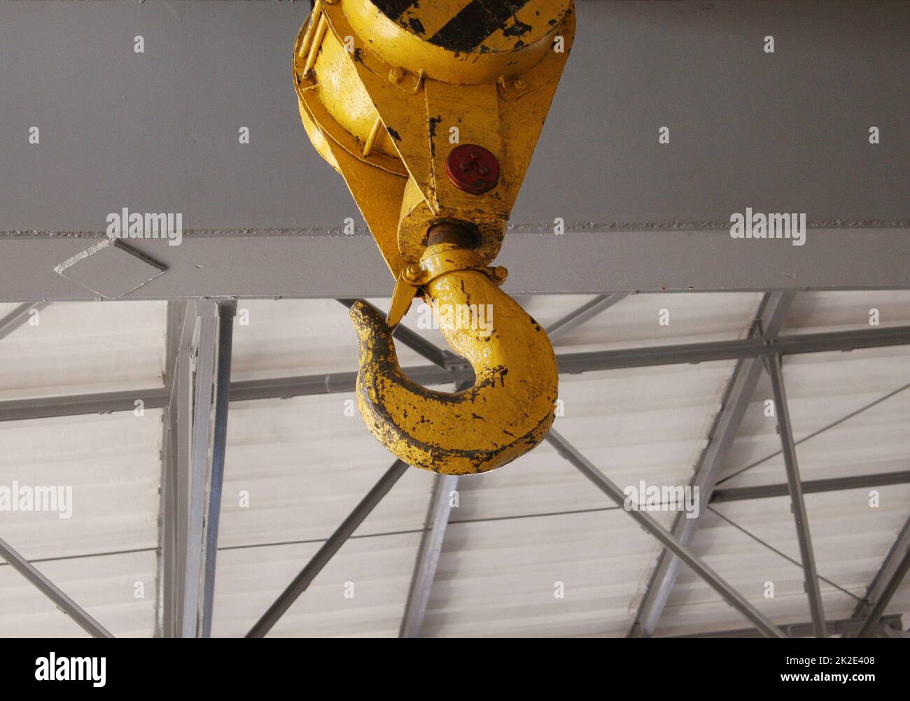 Swivel electric crane hook for overhead crane in the workshop Stock Photo